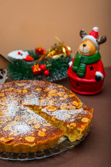 Swedish Almond pie tart with christmas themed background