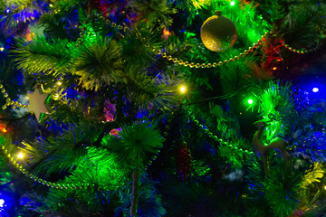 Obraz na płótnie Canvas Christmas tree elegant illumination toys colorful light
