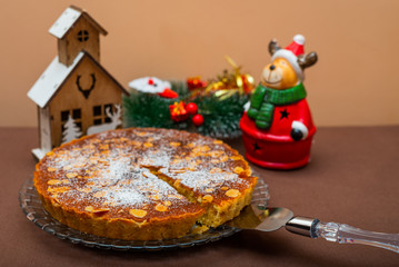 Swedish Almond pie tart with christmas themed background