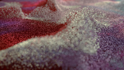Colored Glitter particles with defocused blur background
