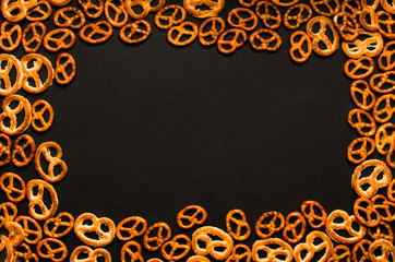 Cookies frame isolated on black background with text space in middle