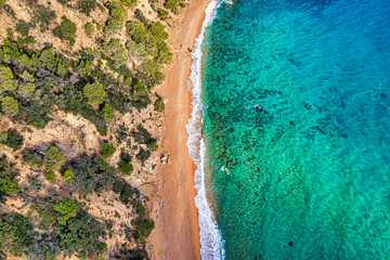 Sea Aerial view. Top view, nature background. Azure sea beach with rocky mountains and clear water at sunny day. Flying drone. Tropical trees. - 306230678