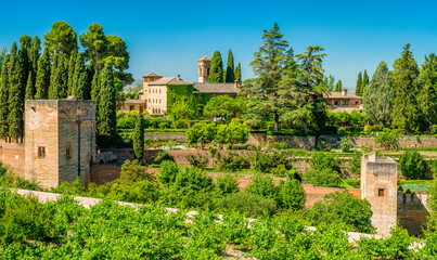 Panoramic sight with the Alhambra Palace as seen from the Generalife in Granada. Andalusia, Spain.