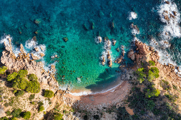 Sea Aerial view. Top view, nature background. Azure sea beach with rocky mountains and clear water at sunny day. Flying drone. Tropical trees. - 306230862