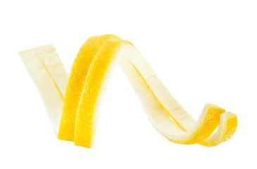 Lemon peel on a white background, close-up. Lemon twist.