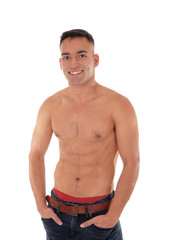 Fototapeta premium Shirtless man standing in jeans and smiling