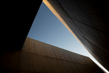 Looking up through the walls of a modern building.