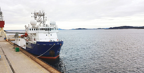 Fototapeta premium Offshore vessel moored in port - seismic