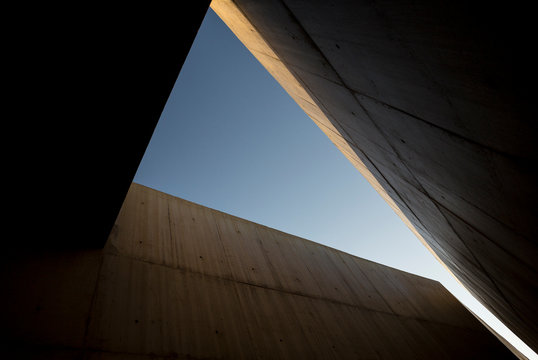 Looking up through the walls of a modern building.