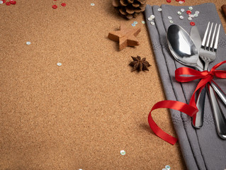 Christmas Dinner Table Setting with Cutlery and Winter Spices