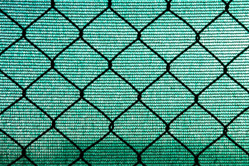fence with a green background
