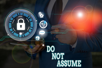 Writing note showing Do Not Assume. Business concept for Ask first to avoid misunderstandings confusion problems