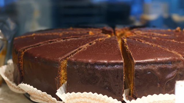 Closeup Of Chocolate Cake On Display In Bakery Or Cafe.