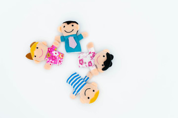 Obraz na płótnie Canvas Happy family: kids son, daughter, mother, father. Family concept. finger puppet dolls.
