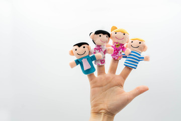 family finger puppet theater. hand with finger puppets: son, daughter,mum, dad. playing show...