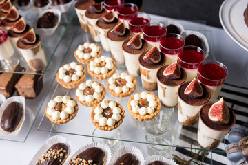 Sweets and cakes. Designer sweets on candy bar
