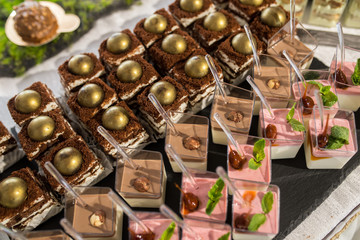 Sweets and cakes. Designer sweets on candy bar