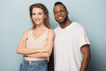 Naklejka premium Smiling African American man and woman posing for photo together