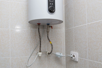 Water boiler connected to the mains. Bathroom.