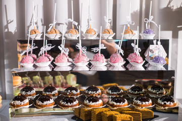 Sweets and cakes. Designer sweets on candy bar