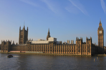 Fototapeta na wymiar Enjoying the view of Big Ben by the Thames River, in London