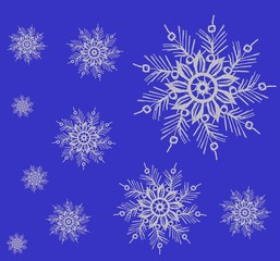 Fototapeta na wymiar Snowflakes on a blue background. Abstract texture. Delicate background for printing on wrapping paper, postcards, scrubbing, wallpaper, packaging. Winter holiday snow background. Christmas abstract ba