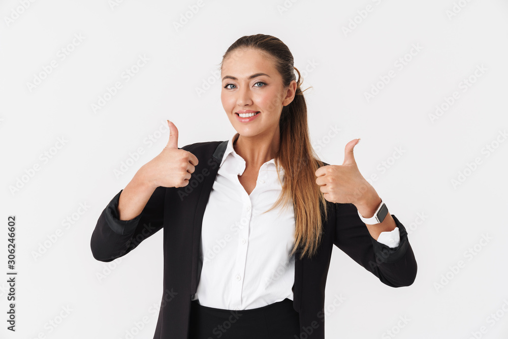 Wall mural Photo of happy businesswoman looking at camera and showing thumbs up