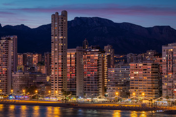 Naklejka premium Modern city of Benidorm at evening lights, Alicante Mediterranean of Spain