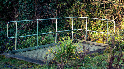 hidden metal platform in forest