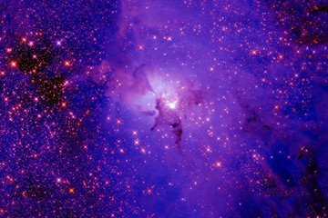 Violet-blue nebula in deep space. Elements of this image were furnished by NASA.