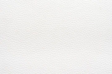 Close-up of natural white leather background . Top view, copy space .