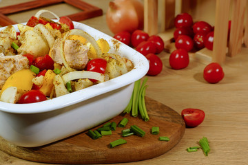 Cooking turkey meat with tomatoes and sweet pepper