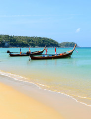Long boat and tropical beach