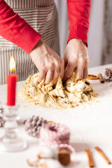 Obraz na płótnie Canvas Baking a tradinional german fruit cake stollen. Christmas stollen