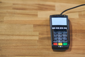 bank terminal for payment in a cafe