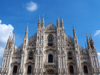 Fototapeta na wymiar View of the exterior of the Milan Cathedral (Duomo di Milano) in Milan, Italy. It is dedicated to the Nativity of St Mary (Santa Maria Nascente).