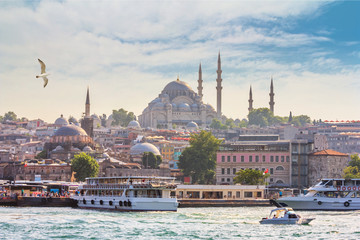 Summer city landscape - view of the promenade of Istanbul and the historical district of Fatih, in Turkey - obrazy, fototapety, plakaty
