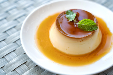 Pudding Caramel Custard with top view of a creme caramel, caramel custard or custard pudding.
