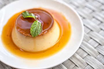 Pudding Caramel Custard with top view of a creme caramel, caramel custard or custard pudding.