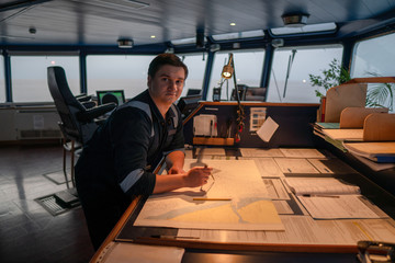 Marine navigational officer during navigational watch on Bridge . He does chart correction of nautical maps and publications. Work at sea