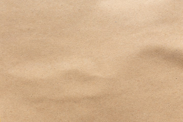 Sheet of brown paper texture use as a background.