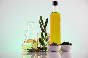 Cooking olive oils, bottles background