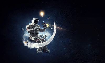 Spaceman and his mission. Mixed media