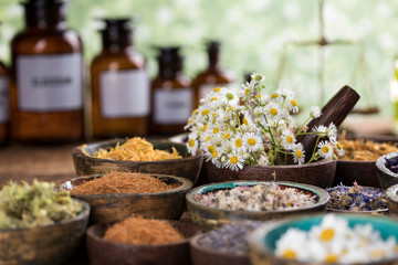 Natural remedy,Herbal medicine and wooden table background