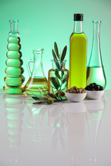 Cooking olive oils, bottles background