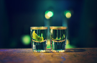 Mezcal and Tequila shots close up nice soft light atmosphere