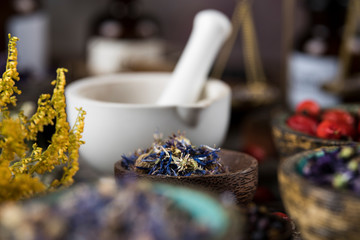 Herbs medicine and vintage wooden background