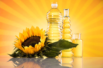Bottles of sunflower oil with flower