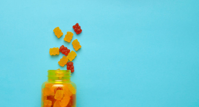 Gummy Bear Vitamin On Colorful Background.