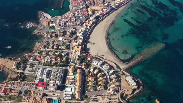 Aerial view of Cape Palos resort city Spain region of Murcia sunny day vertical top view 